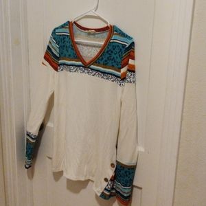 Cute long sleeve top with lots of character!